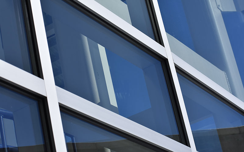 close up of windows on the side of a skyscraper